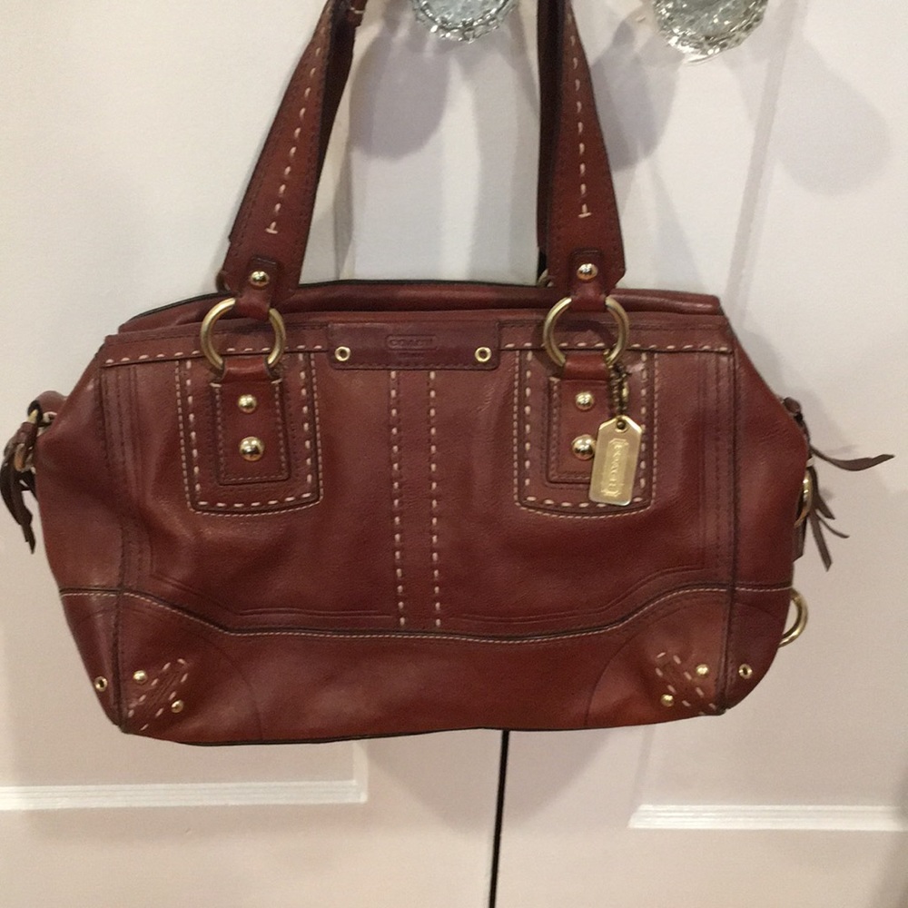Brown leather coach purse with gold hardware